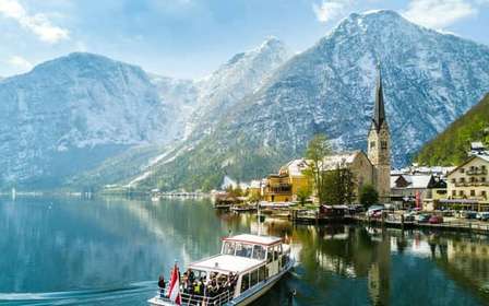 Vanuit Wenen: dagtour Hallstatt en Salzburg met schilderachtige boottocht